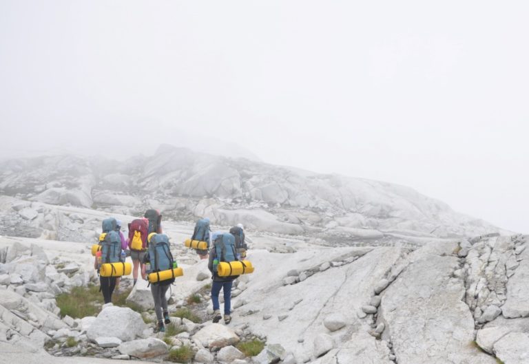 how to pack a tent in the backpack
